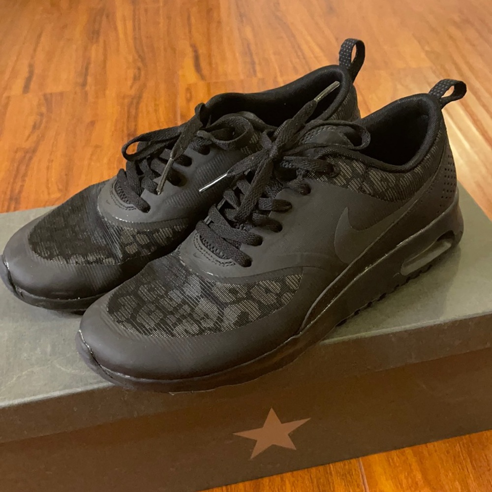 Leopard print black womens Nike size 8 shoes